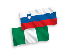 Flags of Slovenia and Nigeria on a white background