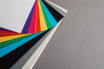 Color palette on grey background, closeup. Space for text