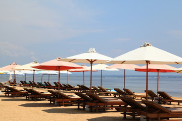 Rows of umbrellas on empty