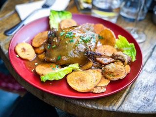 delicious roasted duck leg & french potatoes dish