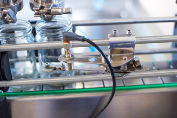 Glass jars in a food production workshop