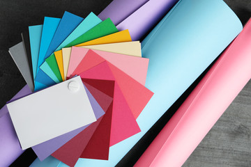 Flat lay composition with color palette on grey stone background