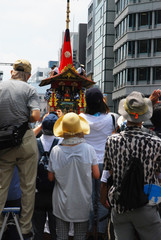 you can see the head of a float "Hoko" beyond clouds at Gion festival in July in kyoto Japan.
