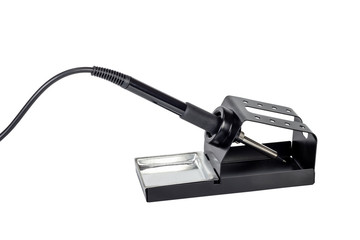Electric soldering iron on a stand.