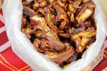 Dried apples. Dry fruits in paper bag.