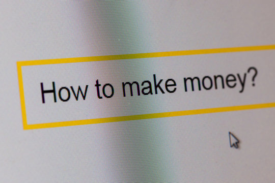 Words How to make money? in search bar on computer monitor