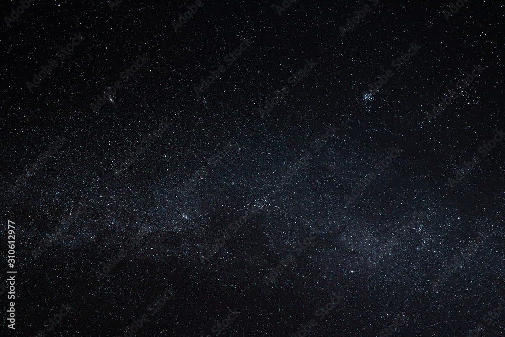 Wall mural dark starry sky with many stars, universe background
