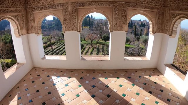 Tilt shot of views of the Alhambra from a Generalife tower. Granada, Andalusia, Spain. 4K shot.