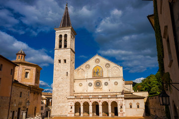 Fototapeta na wymiar The wonderful Spoleto Cathedral, a city landmark completed in the 13th century, with clouds above