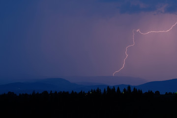 Thunderstorm with lightning on the mountain.