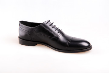 black leather shoes isolated on white background