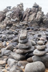 The gatz Balancing Rocks, Rocky mountains by people who pass the road and stop to pile their rocks on the seashore.