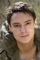 Portrait of a young man is army clothes