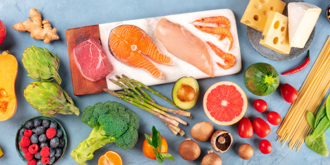 Food, a flatlay panorama of beef meat, salmon fish, chicken and shrimps, vegetables and fruits,...