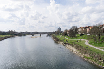 View of a river and its green banks in spring