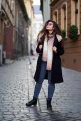 Fototapeta premium Urban portrait of a young woman