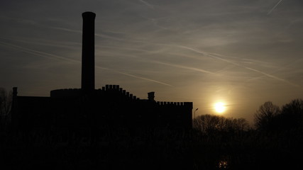 industrial factory at sunset