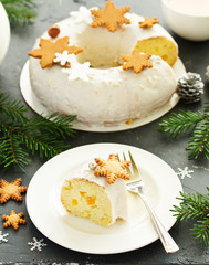 Christmas cupcake with spices, candied fruits, with gingerbread cookies and nuts.