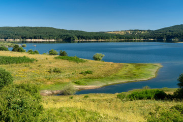 Fototapeta na wymiar Summer landscape along the road to Camigliatello, Sila. Cecita lake