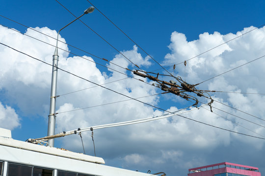 Overhead Catenary, Part Of Overhead Line Equipment Of Passenger City Electric Bus. Electrification System