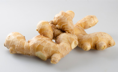 ginger or ginger root on the background new.