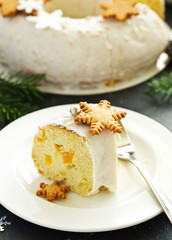 Christmas cupcake with spices, candied fruits, with gingerbread cookies and nuts.