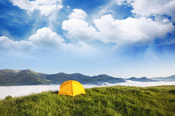 Tourist camping tent in a mountains. Carpathian, Ukraine, Europe. Beauty world.