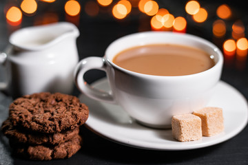 A cup of hot chocolate with gingerbread