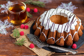 Beautiful festive cupcake decorated with whipped squirrels and raspberry jelly.