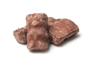 Closeup of marshmallow chocolates in shaped bear on white background