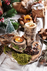 rustic style Christmas decoration with wooden candle holders