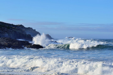 Waves breaking against the cliffs. in Moreira, Muxia in the Atlantic Galician Coast, Spain.