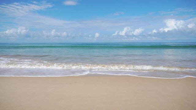 Beautiful tropical beach with blue sky and white cloud background. Summer vacation and nature environment concept.