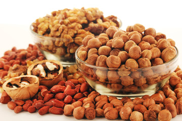 Different nuts in glass cups	