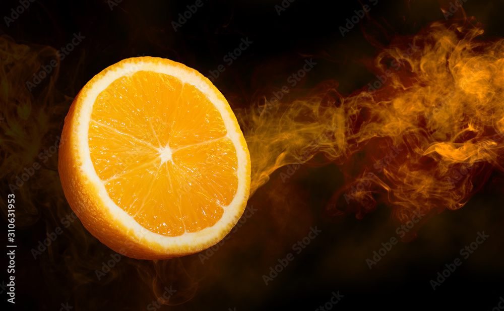 Wall mural close up of a cut orange in a smoke swirl flying on dark background