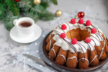 Beautiful festive cupcake decorated with whipped squirrels and raspberry jelly.