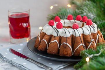 Beautiful festive cupcake decorated with whipped squirrels and raspberry jelly.