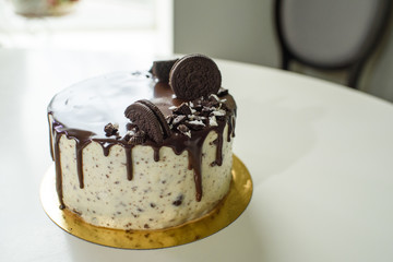 Oreo cake on a table in a cozy coffee shop