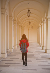 Young Asian woman tourist  walking near The palace in Austria