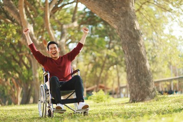 Asian man in wheelchair 