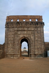 Fototapeta na wymiar Entrance gate at Raigad fort and Thorne of King Shivaji is seen in background. Maharashtra, India