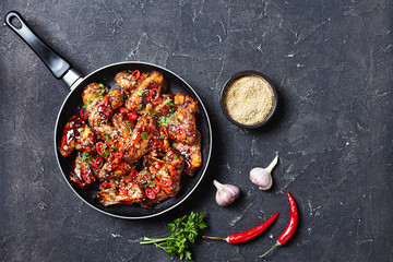 fried chicken wings in teriyaki sauce, flatlay