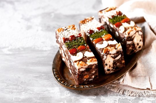 Chocolate halva with different nuts