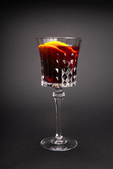 glass of wine in the studio on a gray background