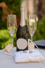 Wedding rings and champagne