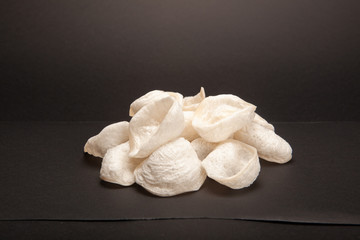 white chips on dark background