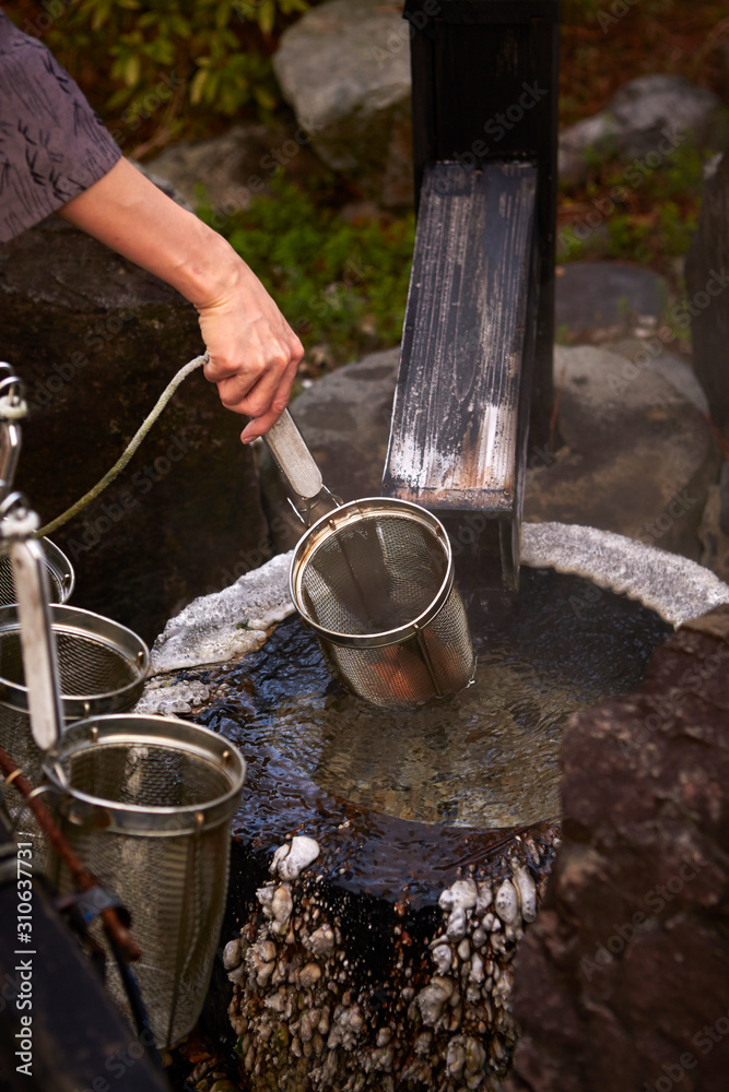 Poster hot spring with strainer for boiling egg