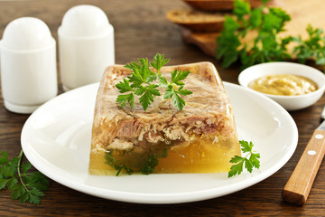 Homemade meat jelly with mustard. Selective focus