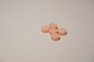 A lot of pills. A medicine for a sick person.