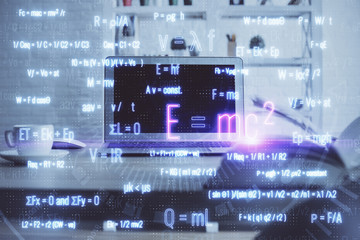 Desktop computer background and formula hologram writing. Double exposure. Education concept.